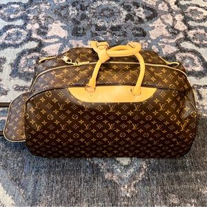 Authentic Louis Vuitton Monogram Eole 60 M23202 Rolling luggage.
